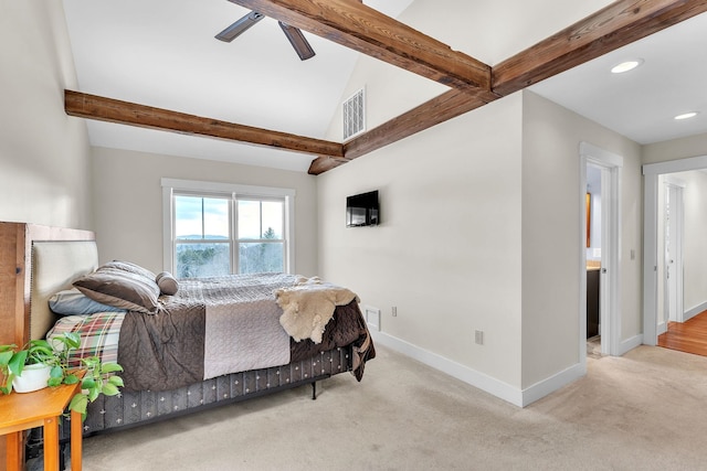 carpeted bedroom featuring lofted ceiling with beams and ceiling fan