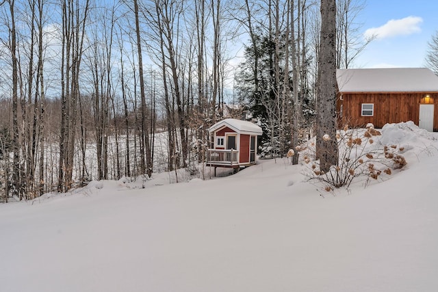 view of yard covered in snow