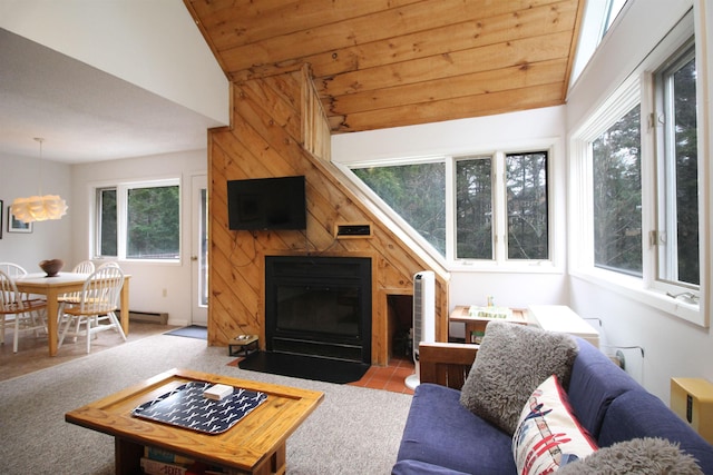 living room with a baseboard radiator, lofted ceiling, a large fireplace, and wood ceiling