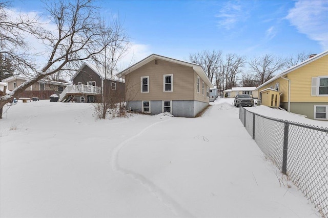 view of snow covered house