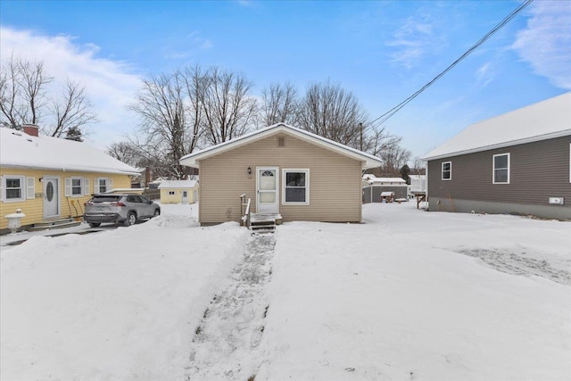 view of snow covered house