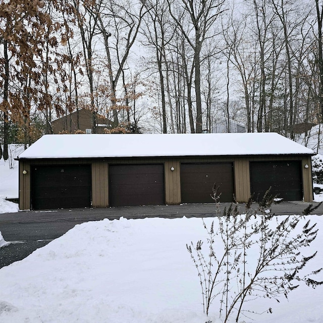 view of snow covered garage