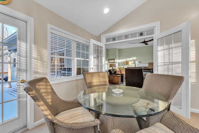 dining room featuring ceiling fan and vaulted ceiling