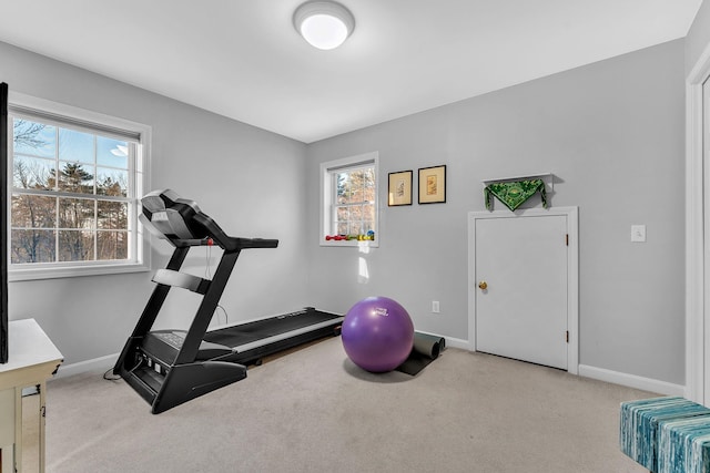 workout room with light colored carpet