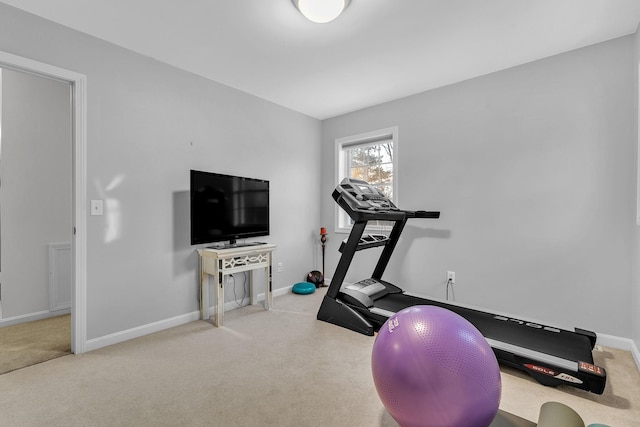 workout area featuring carpet