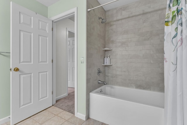 bathroom featuring tile patterned flooring and shower / bathtub combination with curtain