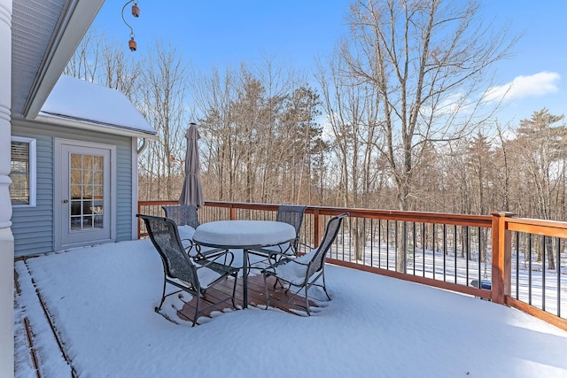 view of snow covered deck