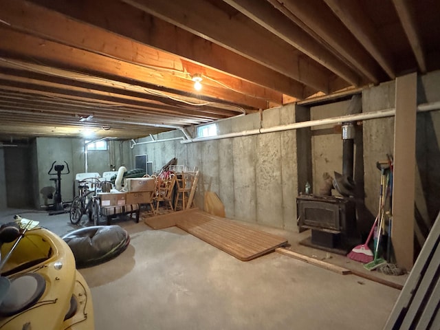 basement featuring a wood stove