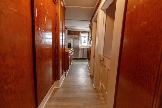 corridor featuring light hardwood / wood-style floors