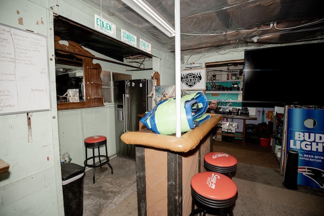 basement with high end fridge