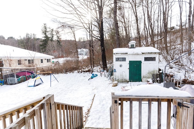 view of yard covered in snow