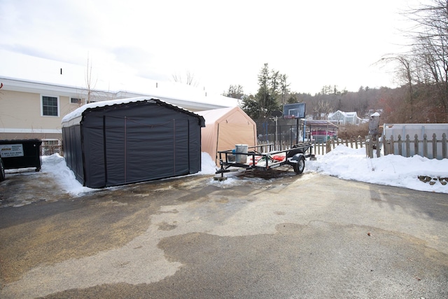 view of snow covered garage