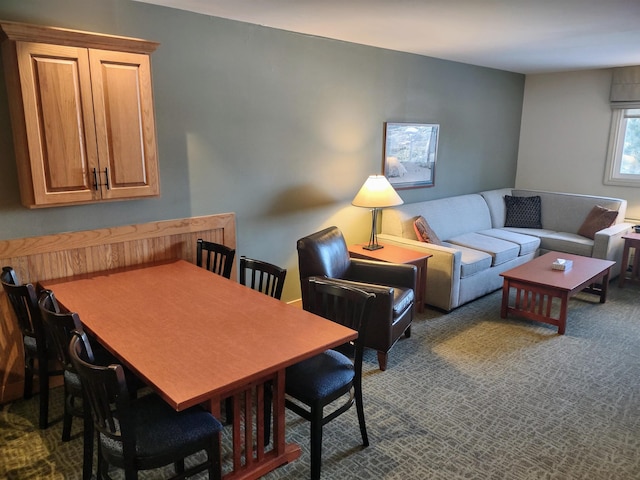 view of carpeted dining space