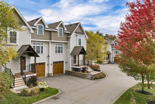 view of front of property with a garage