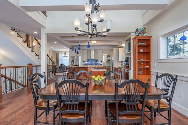 dining room featuring dark hardwood / wood-style floors and a notable chandelier