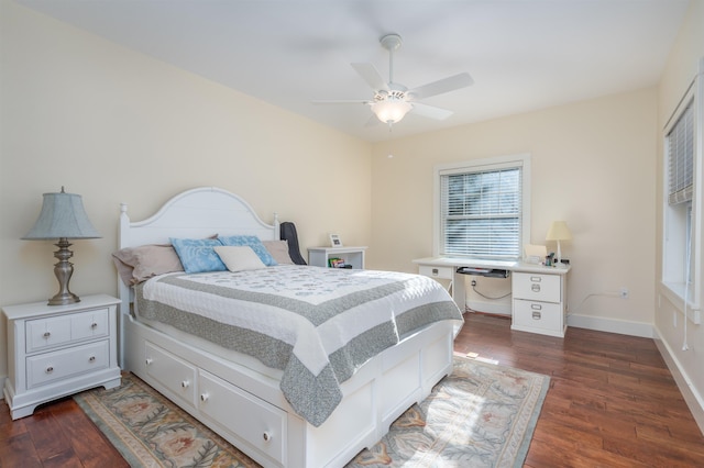 bedroom featuring dark hardwood / wood-style flooring and ceiling fan