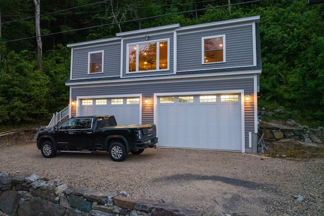 view of front of property featuring a garage