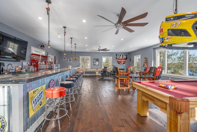 playroom featuring dark wood-type flooring, billiards, and indoor bar