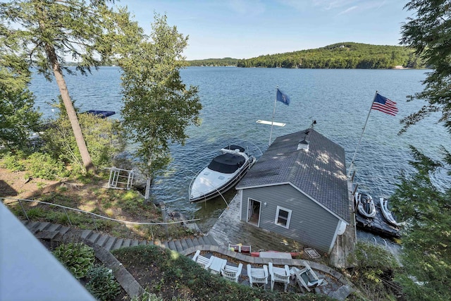 exterior space with a water view