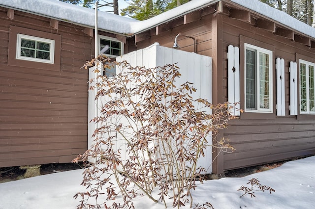 view of snow covered property