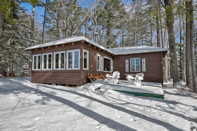 view of snow covered property