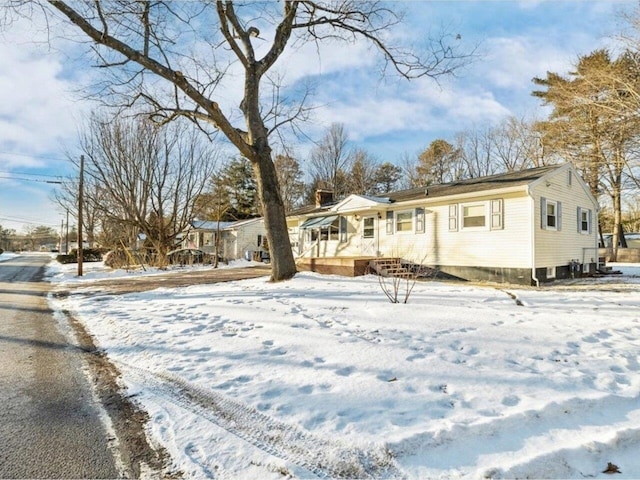 view of snow covered property