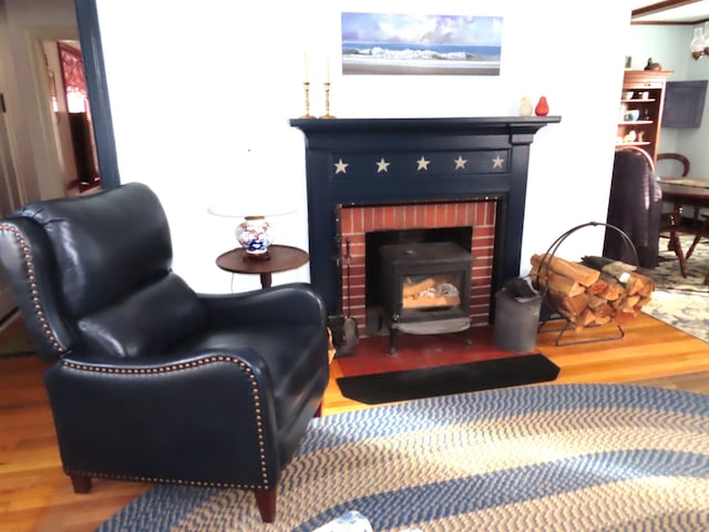 sitting room featuring wood-type flooring