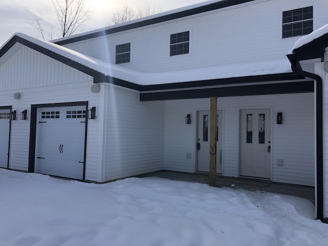 7 Willys Ln Unit 104, Milton, VT 05468 - view of front of home with a garage