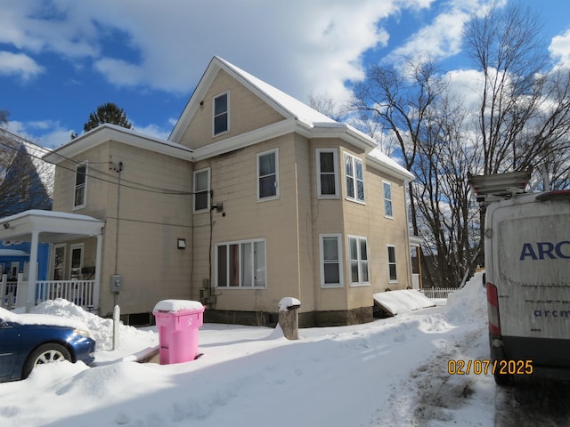 view of snow covered property