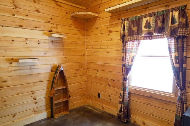 interior space featuring wooden walls