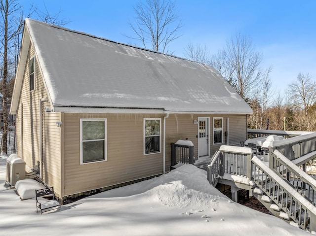 view of snow covered house