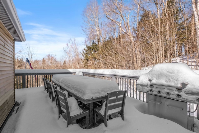 view of snow covered deck