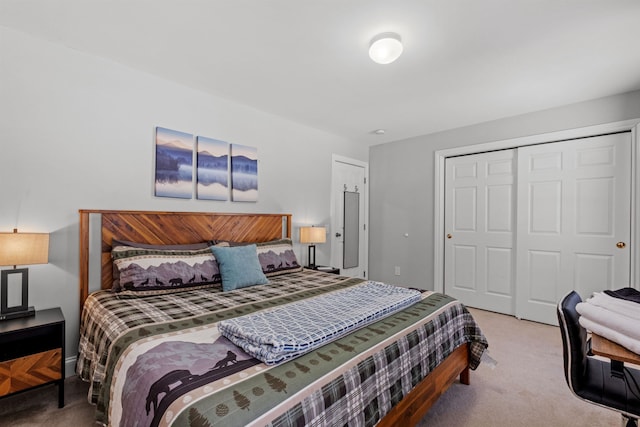 bedroom with a closet and carpet flooring