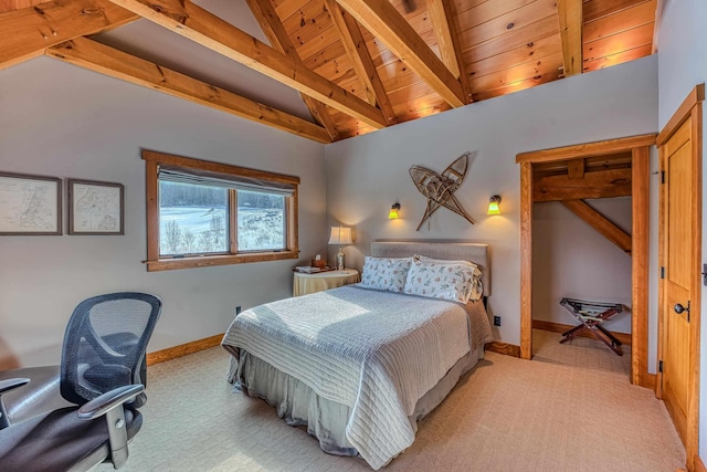 carpeted bedroom with lofted ceiling with beams and wooden ceiling