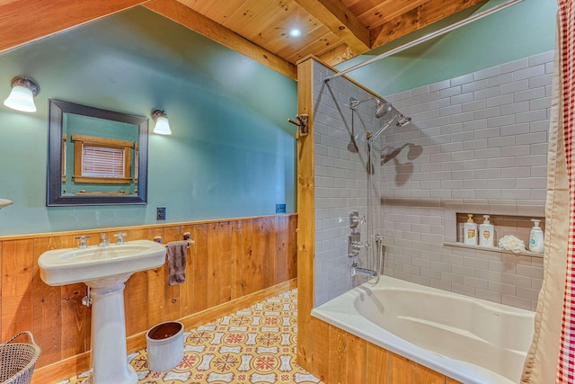 bathroom featuring sink, wood ceiling, beam ceiling, wooden walls, and shower / bath combination with curtain