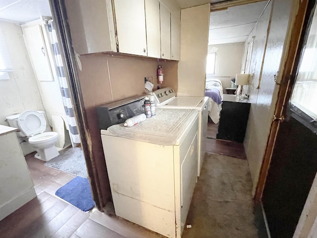 laundry area with washer and clothes dryer