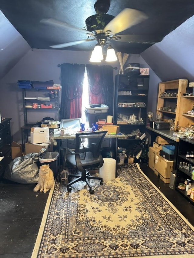 office area featuring vaulted ceiling and ceiling fan