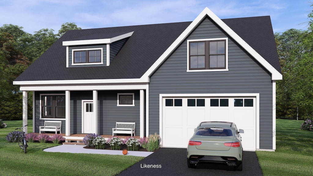 view of front of home with a garage, a front yard, and covered porch