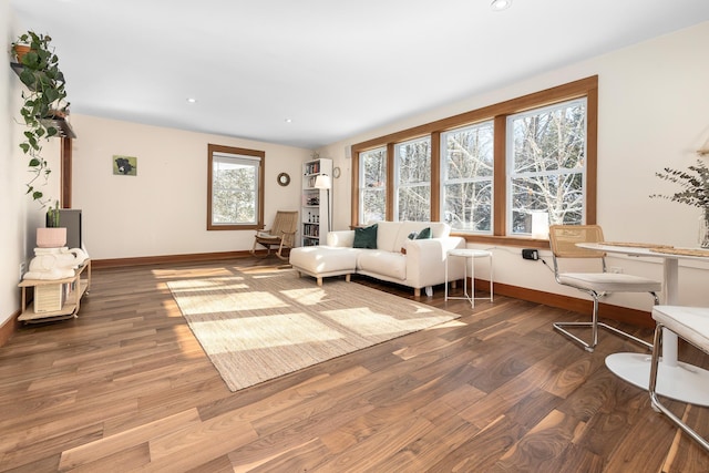 unfurnished living room featuring hardwood / wood-style flooring