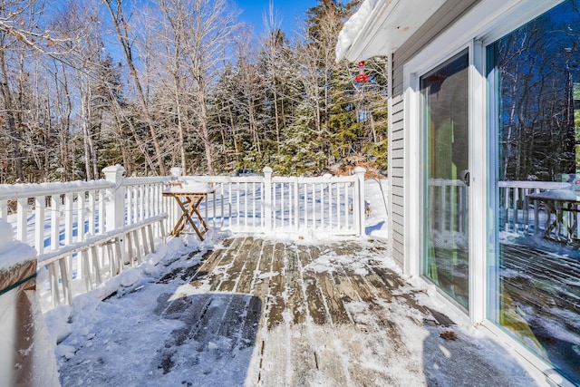 view of snow covered deck