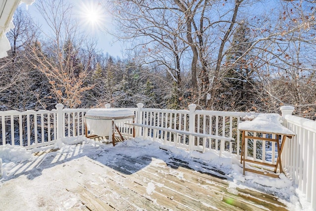 view of snow covered deck