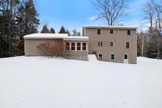 view of snow covered property