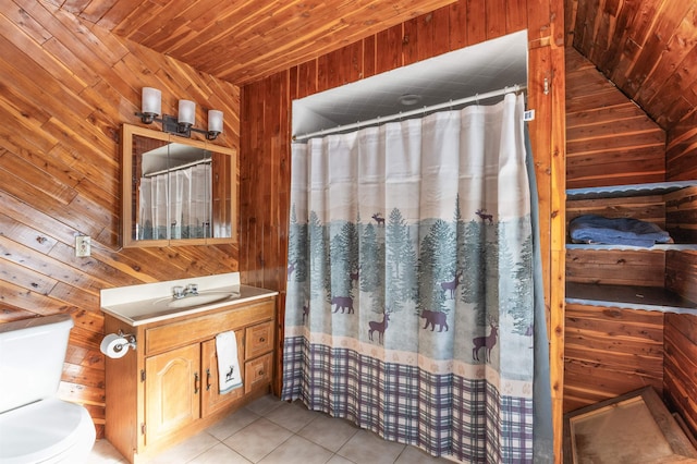 bathroom featuring wood ceiling, tile patterned floors, toilet, and wood walls