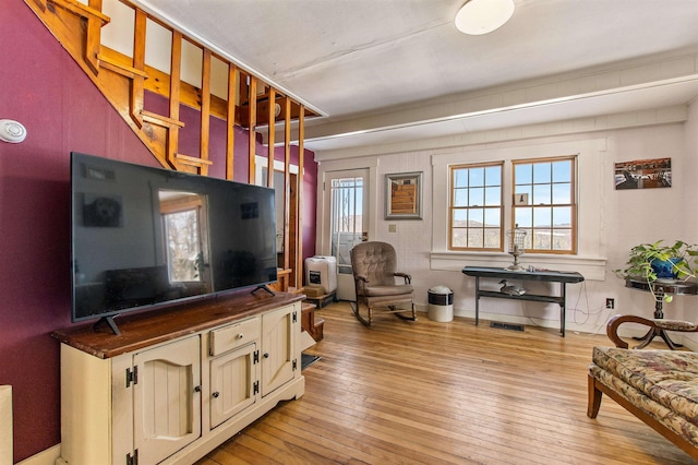 sitting room featuring light hardwood / wood-style flooring