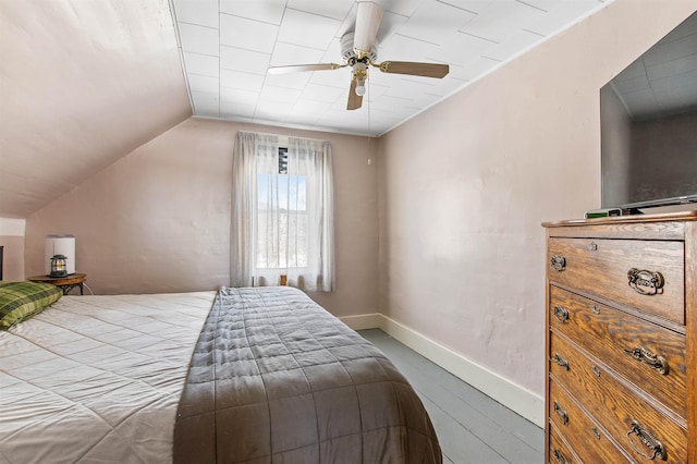 bedroom featuring vaulted ceiling and ceiling fan