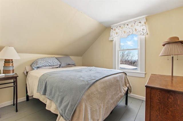 bedroom featuring vaulted ceiling