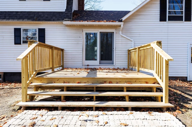 rear view of property with a deck