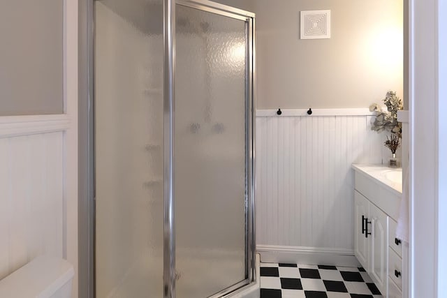 bathroom featuring vanity and walk in shower