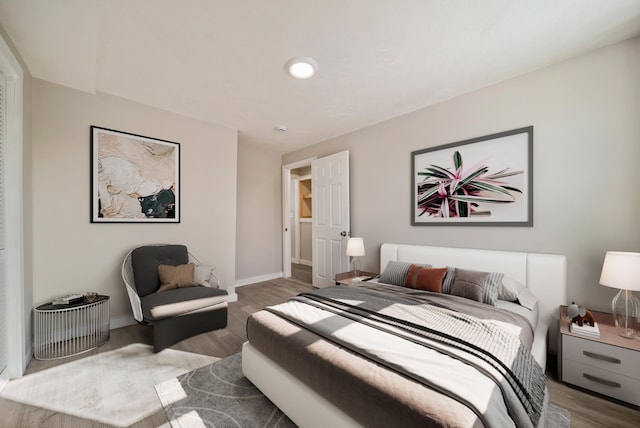 bedroom featuring dark wood-type flooring