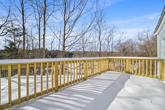 view of snow covered deck